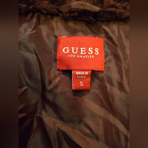 GUESS Faux Fur bomber jacket. Zip up. Fully lined. Size Small. Eggplant/ Purple. - Picture 3 of 10